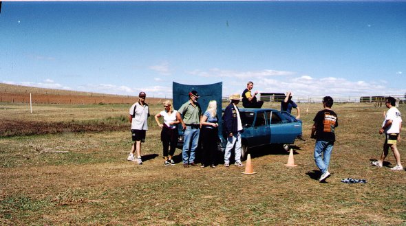 end of the day with members of the Qld group standing near the car.